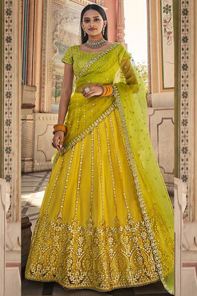 yellow net lehenga choli with dupatta