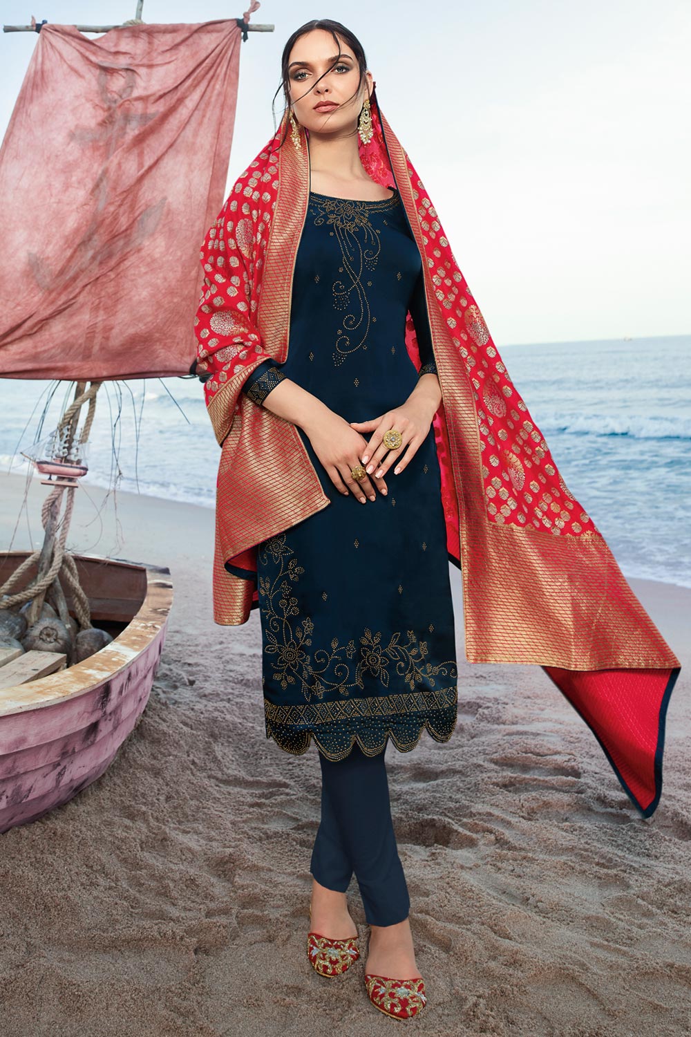 navy blue suit with red dupatta