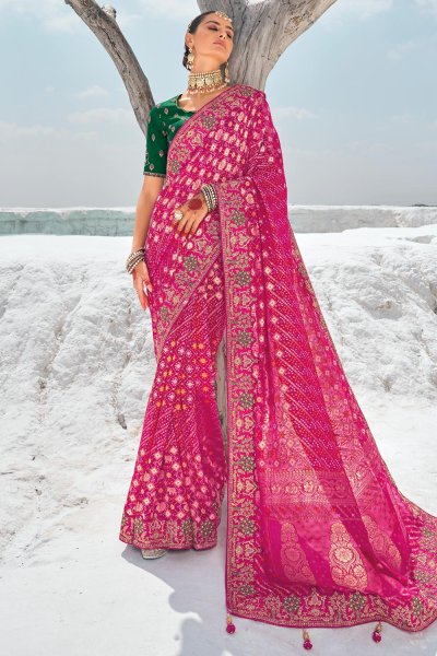 Pink Georgette Bandhani & Patola Embroidered & Zari Woven Saree